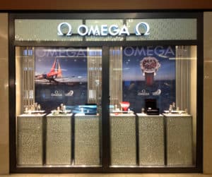 Omega graphics store sign